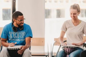 Individuals contribute their unique rhythms into a shared group sound. This creates an in the moment experience that is greater than any individual can produce alone.